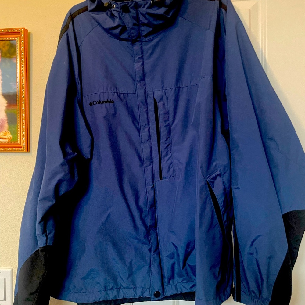 Rain coat Columbia Blue with black trim.